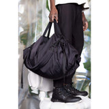 Cote & Ciel Obed Smooth Classic Duffle Bag | Black