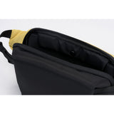 Cote & Ciel Isarau Small Padded Sling Bag | Yellow