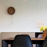 Nomon Swing G Classic Pendulum Clock | Walnut Finished Alder Wood/Brass