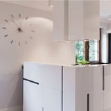 Nomon Tacon 12 I Wall Clock | Steel/Chromed Brass