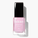 A bottle of LONDONTOWN Pink Palm nail polish in pastel pink with a black cap. The label reads "lakur Enhanced Colour by LONDONTOWN".