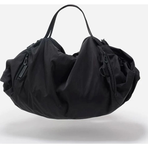 Cote & Ciel Obed Smooth Classic Duffle Bag | Black