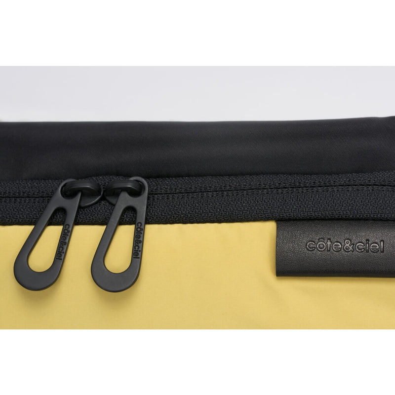Cote & Ciel Isarau Small Padded Sling Bag | Yellow