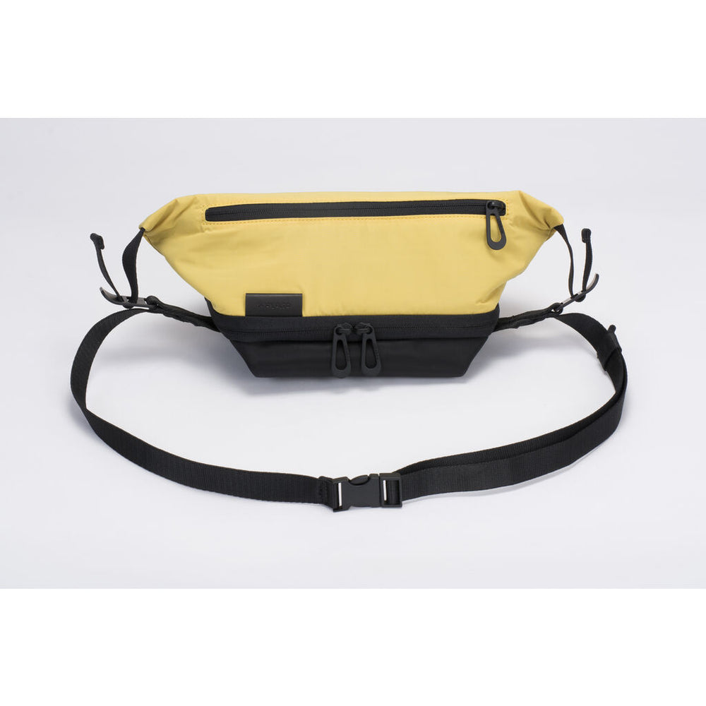 Cote & Ciel Isarau Small Padded Sling Bag | Yellow – Sportique