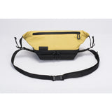 Cote & Ciel Isarau Small Padded Sling Bag | Yellow