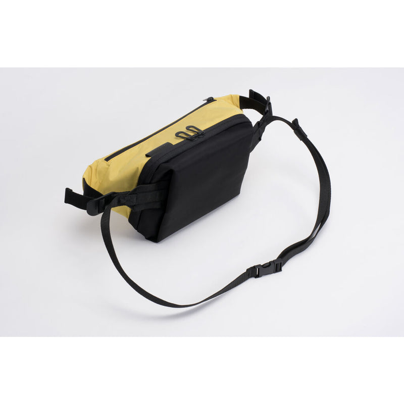 Cote & Ciel Isarau Small Padded Sling Bag | Yellow – Sportique